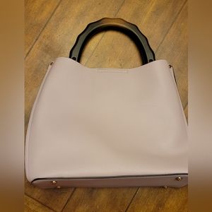 Charming Charlie handbag with wooden handle